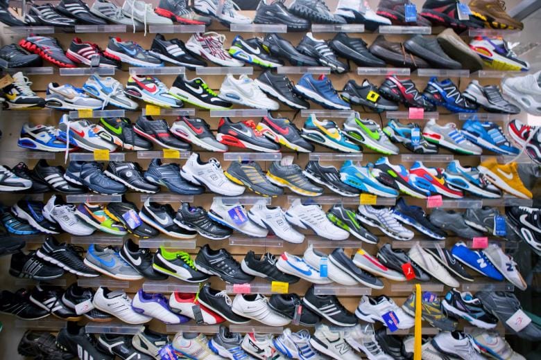 Assorted pairs of shoes on display